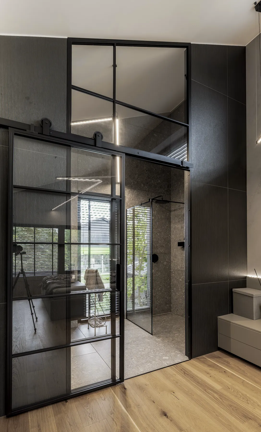 Steel grid running the full height of the room, The Barn Bathroom