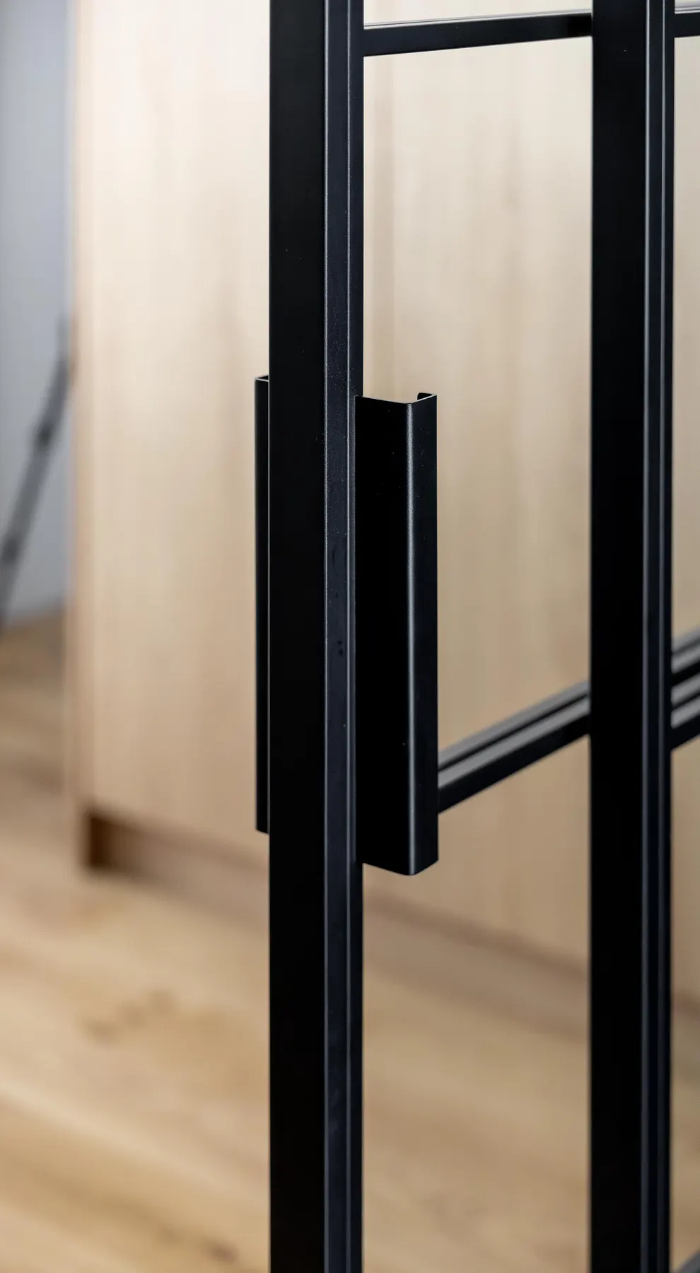 Handle detail on a hand-welded steel door