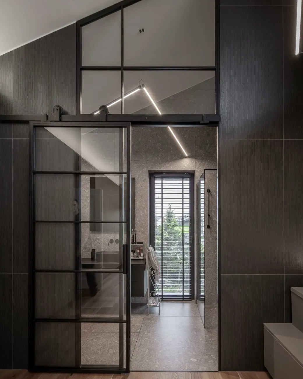 Steel internal door in a dark hallway